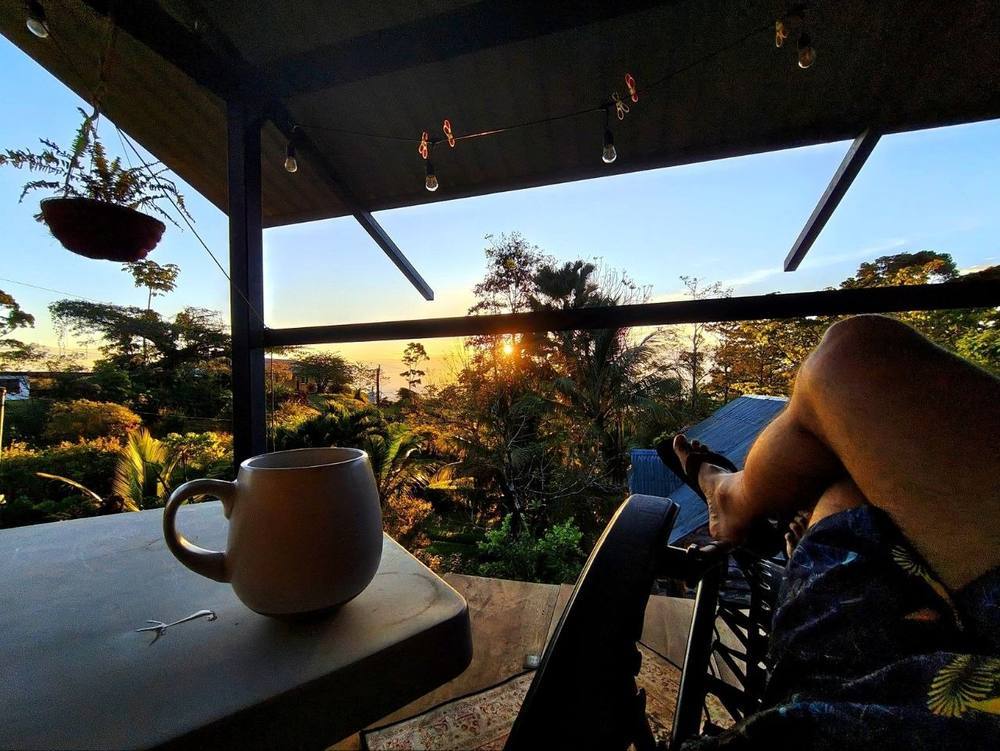 Morning coffee with a view over the forest