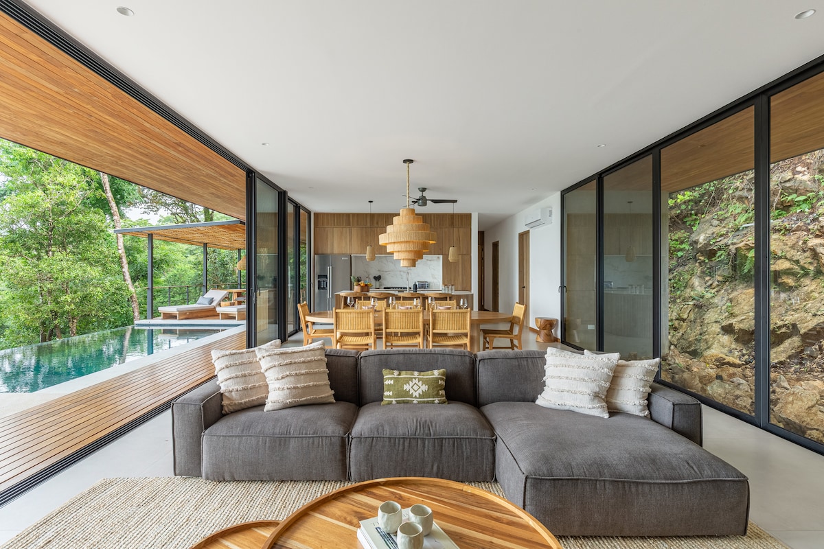 Living room opening to pool