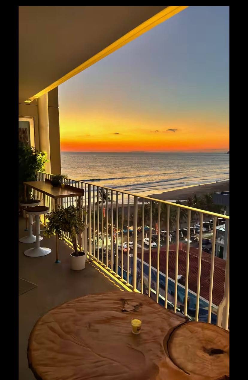 Pacific sunset seen from the private balcony of the condo at Pacific Point, Jacó