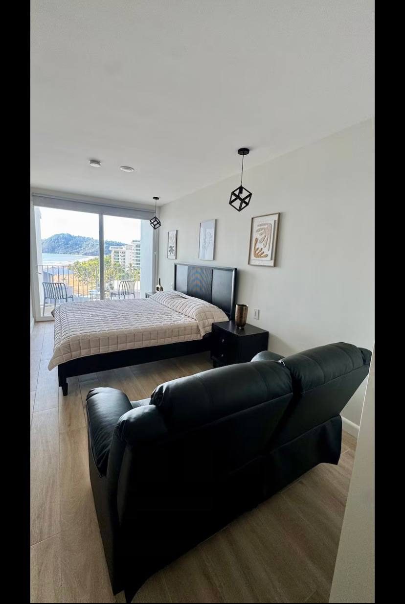 Bedroom with sliding doors to the ocean view