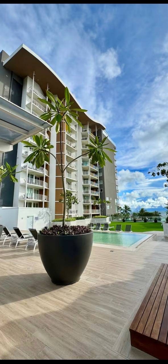 Pacific Point tower and pool area in Jacó