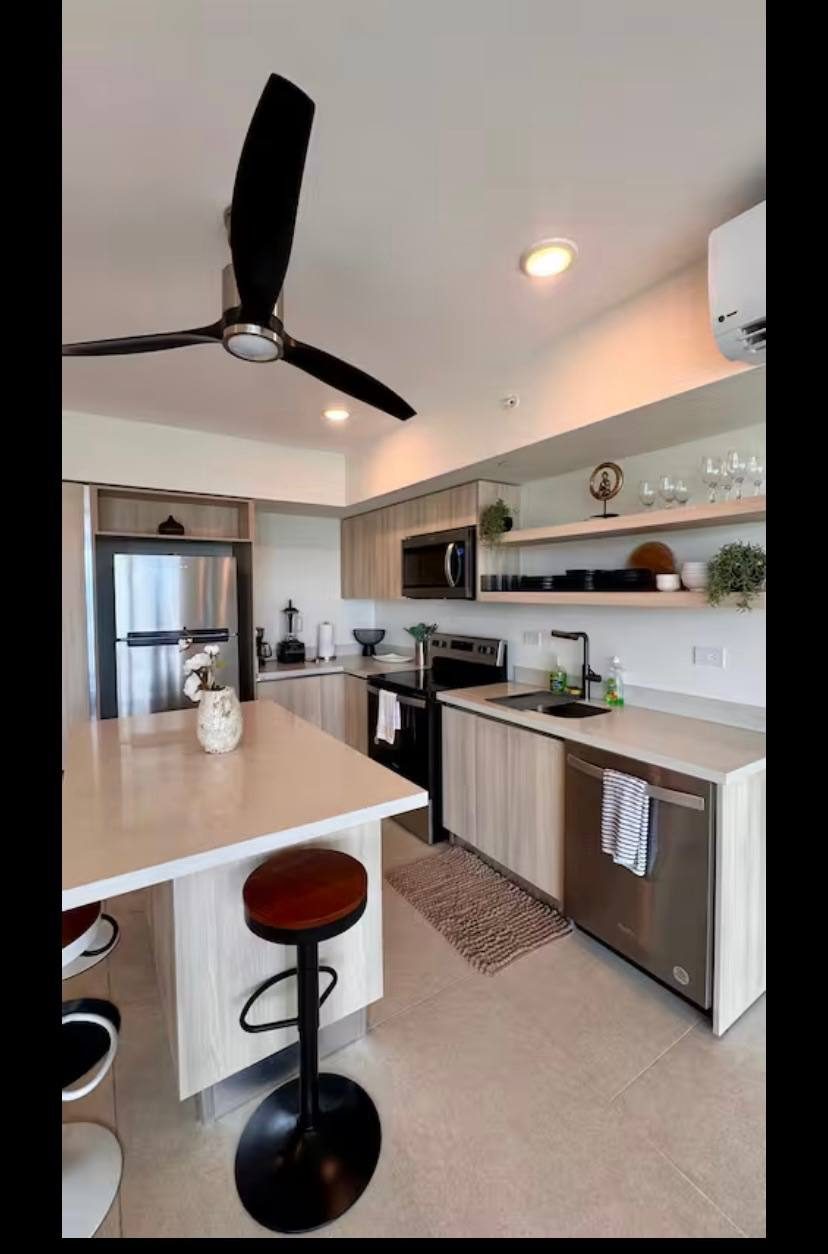Modern kitchen with stainless steel appliances