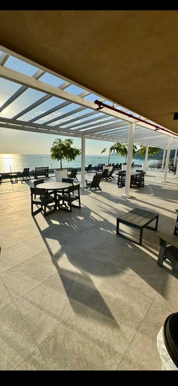 Rooftop lounge with tables and chairs