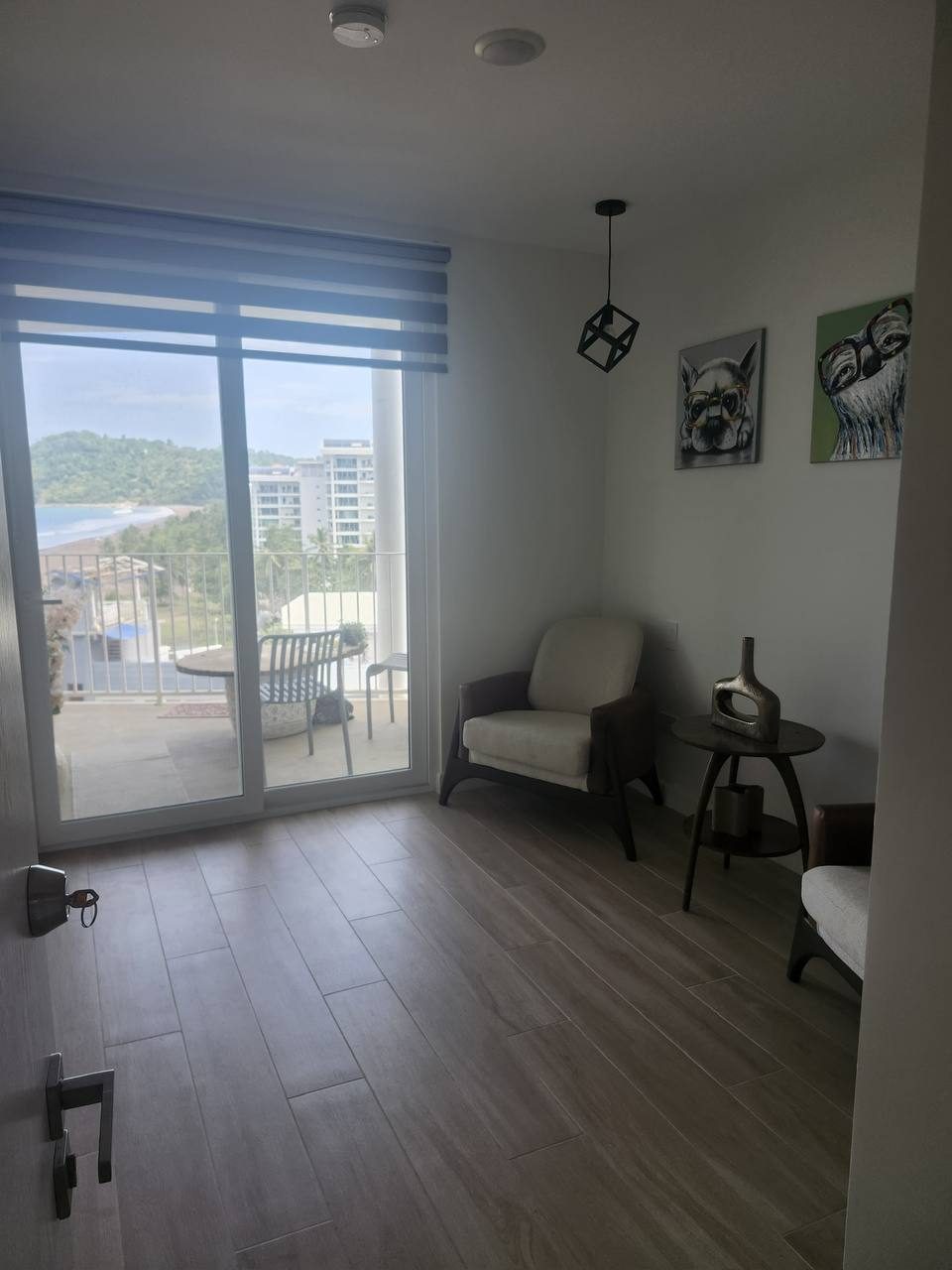 Studio area with sliding doors to the balcony