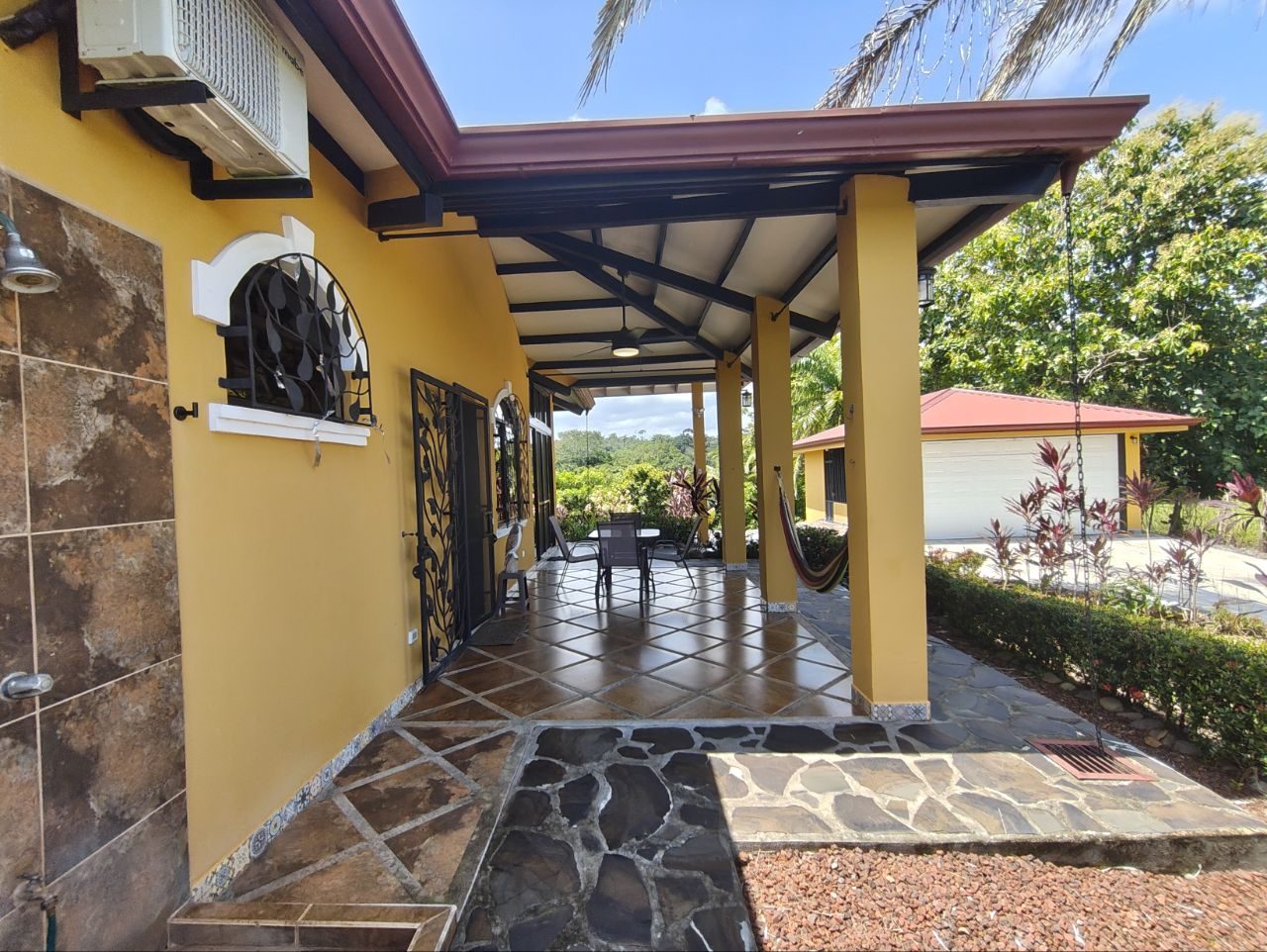 Covered entry walkway of the villa