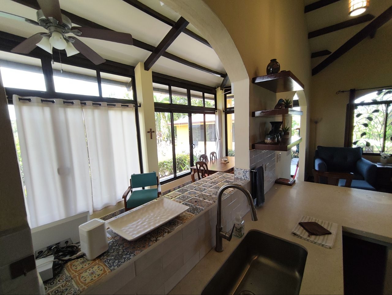 Kitchen bar counter facing the terrace