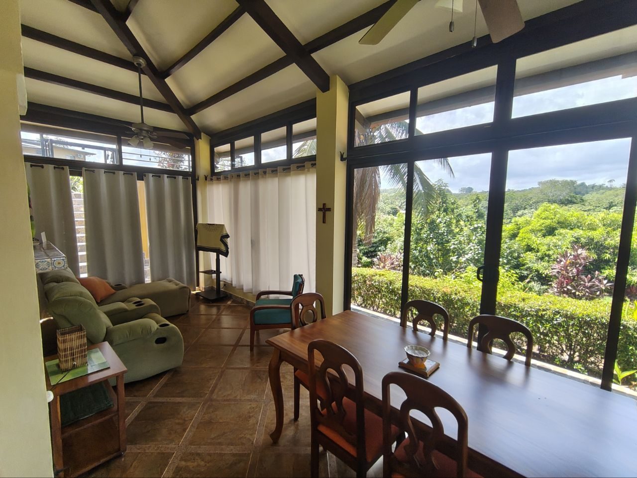 Covered glass terrace and living area