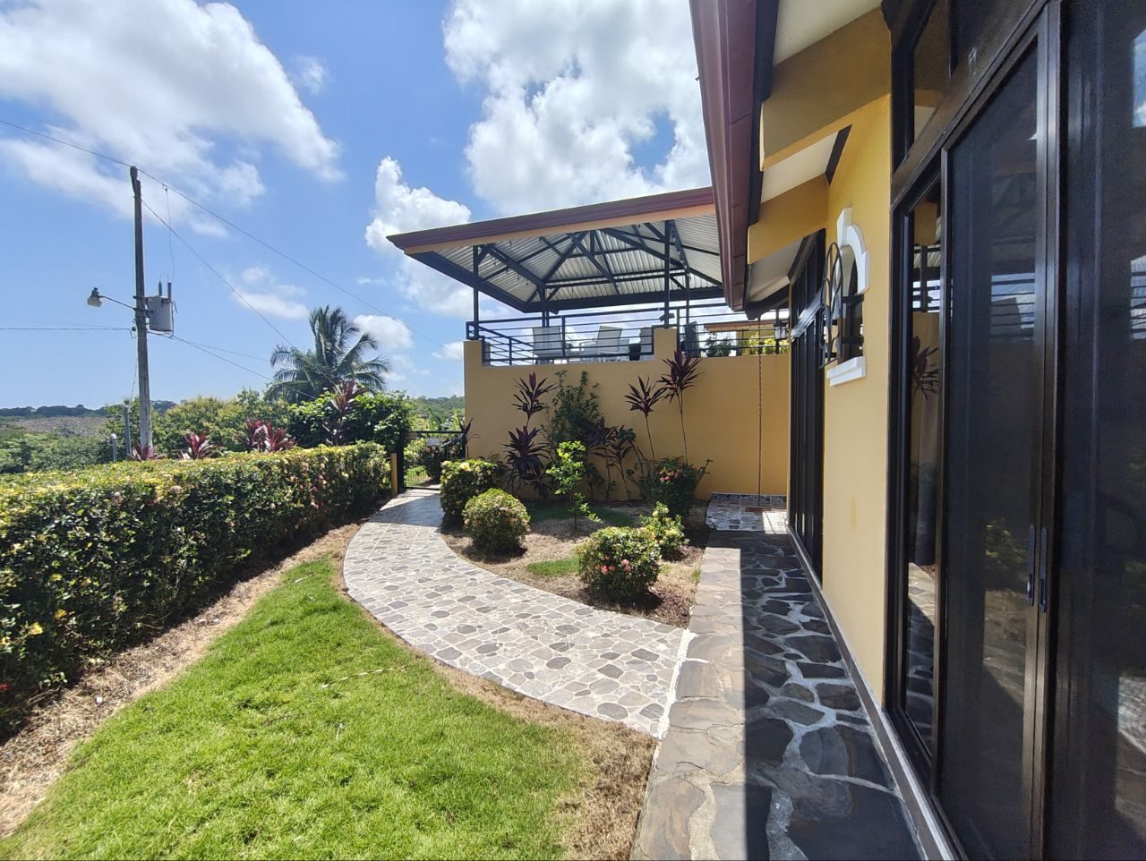 Level pathway through the garden to the house